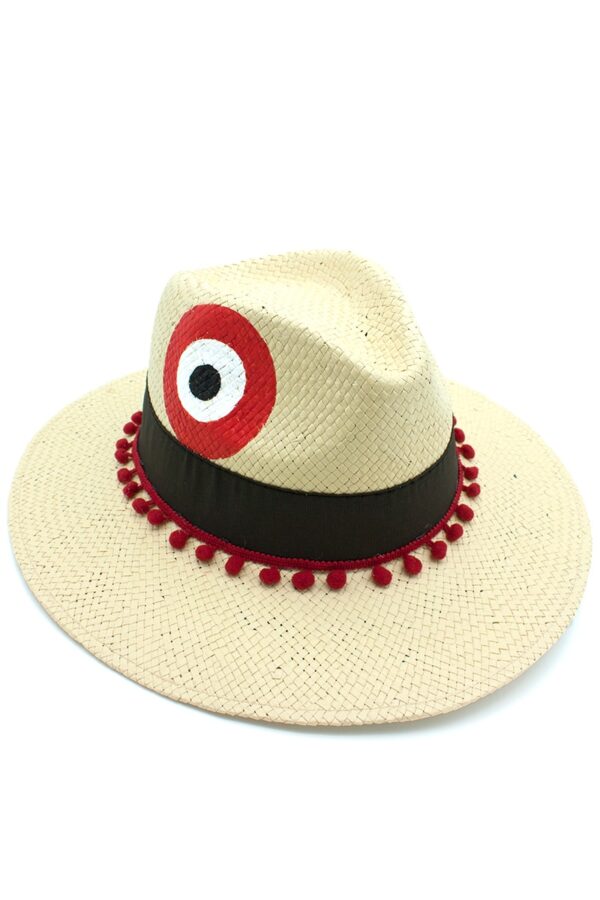 beige hat with evil eye