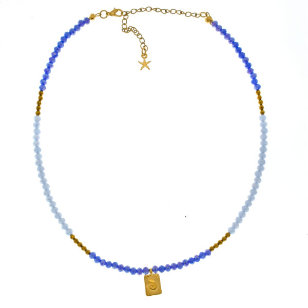 necklace with gold-plated tag and crystal beads